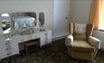 The bedroom seating at Peartree Cottage 1960's Experience