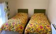 The twin bedrooom at Peartree Cottage 1960's Experience