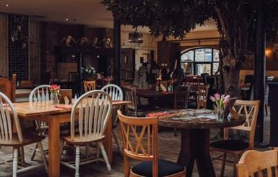 Interior of dining area at South Causey Inn, counntry-feel decor
