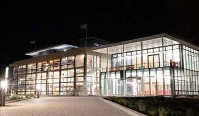 exterior of the new congress theatre conference facility in eastbourne at night time
