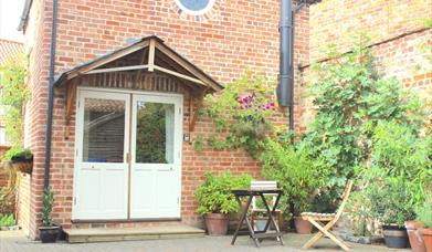 The Cottage entrance and private courtyard at Carpenter's Cottage, Pocklington, East Yorkshire.