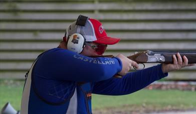 An image of a competitor shooting clays