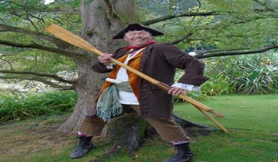 Pirate holding an oar