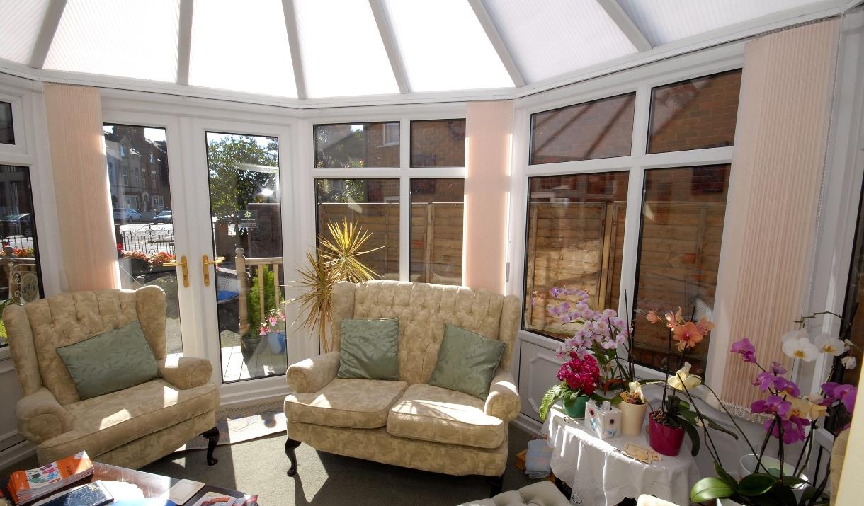 The guest lounge area in a conservatory at Lincoln House in East Yorkshire.