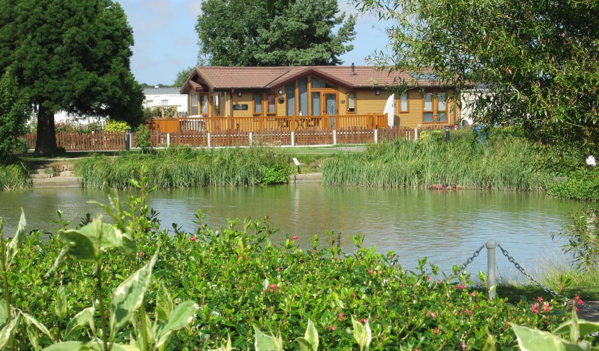 A lodge over looking the lake at Patrington Haven Leisure Park in East Yorkshire.