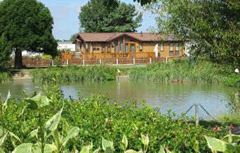 A lodge over looking the lake at Patrington Haven Leisure Park in East Yorkshire.