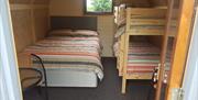 A glamping pod for a family with a double and bunk beds at Seaways Glamping and Camping in East Yorkshire.