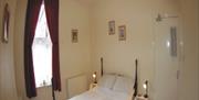 A double bedroom at Imp-ress Holiday Apartments in East Yorkshire.