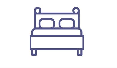An image of an icon of a double bed
