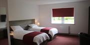 A twin bedroom at Belvedere Hotel & Golf in East Yorkshire.
