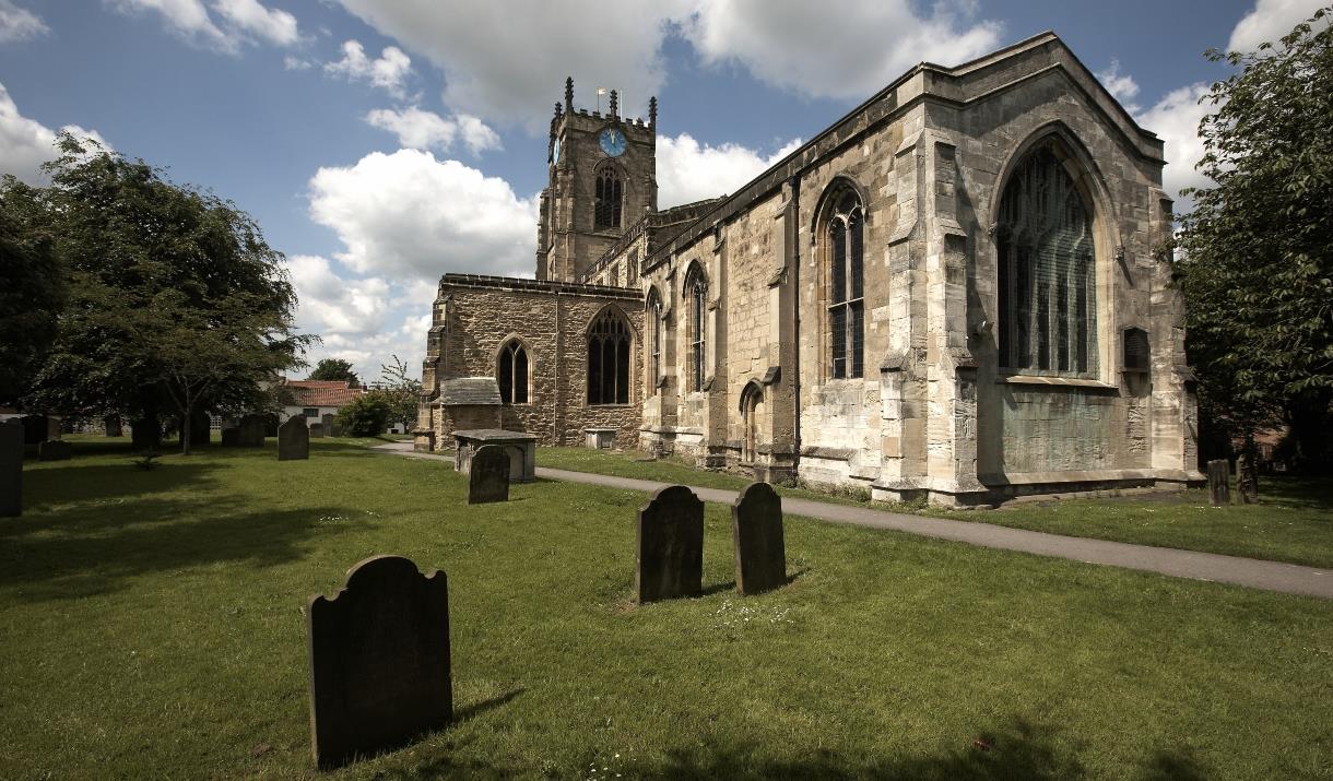 The church and graveyard at All Saints' Church, East Yorkshire