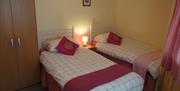 A twin bedroom at  Loucindi holiday cottage in East Yorkshire.