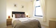 A double bedroom at Carlton Apartments in East Yorkshire.