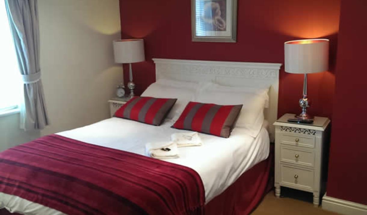 Double bed in a bedroom at the Triton Inn, East Yorkshire