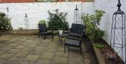 An image of the courtyard garden at Aura Apartment, Beverley, East Yorkshire.