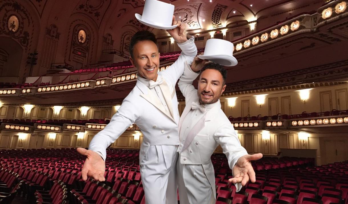 An image of Ian Waite & Vincent Simone, with Hull New Theatre in the background, Hull, East Yorkshire