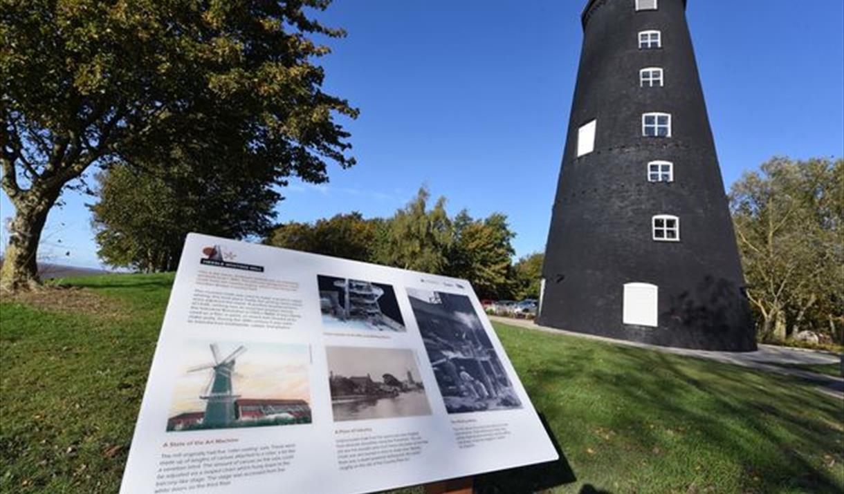 Hessle Mill, newly restored, with information sign at Humber Bridge Country Park, Hessle, East Yorkshire