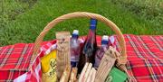 an image of the picnic basket in the vineyard at laurel vines.
