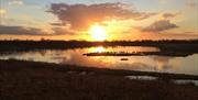 An image of sunset over North Cave Wetlands, near Nordham Cottages