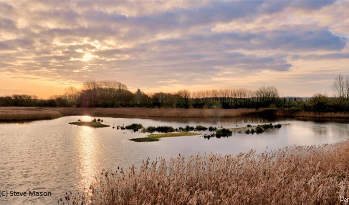 An autumn sunset at Tophill Low Nature Reserve, Driffield in East Yorkshire.