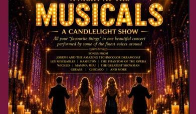 performers surrounded by candlelight 