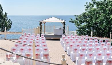 The Osborne Hotel Wedding Fair picture of outside seating overlooking the Meadfoot Beach