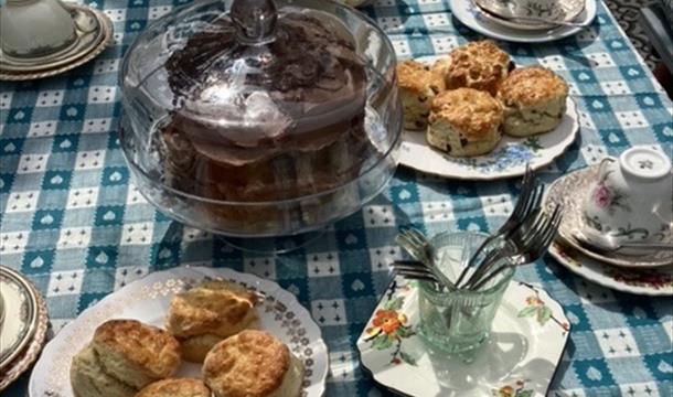 set table for Devon Cream Tea and chocolate cake, Adelphi tea room
