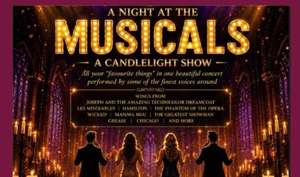 performers surrounded by candlelight