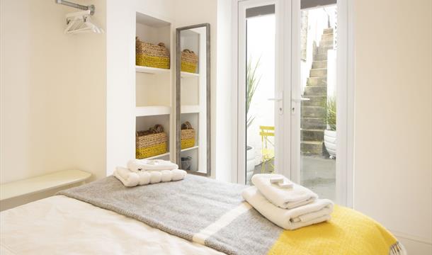 The third bedroom is a double on the ground floor, with patio doors out to the secluded and private rear courtyard