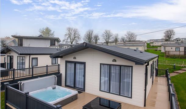 Hot tub on decking at Hoburne Devon Bay, Paignton, Devon