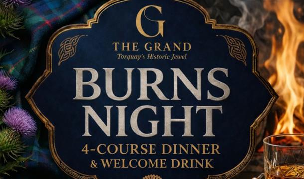 picture of the event showing a glass of scotch and a fire burning