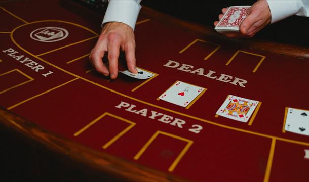 blackjack table and dealer