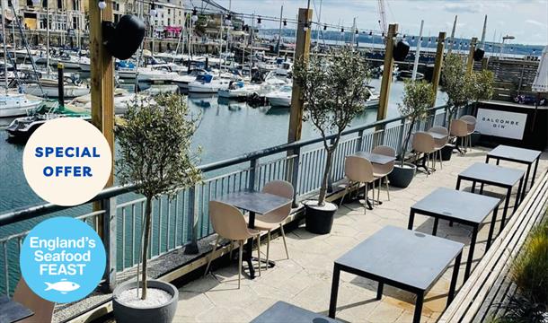 Outside seating overlooking Torquay Harbour at Otto
