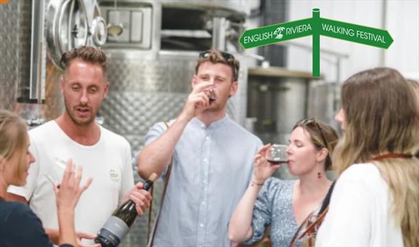 A group of people taste wines at Sharpham Wines, Sandridge Barton