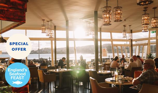 Pier Point’s Perfect Pairing, interior of Pier Point with sea in the background.
