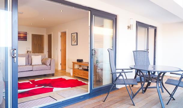 Balcony with outside seating, Plover 3, The Cove, Brixham Devon