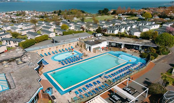 Overhead pool view of Beverley Holidays, Paignton, with sea in background