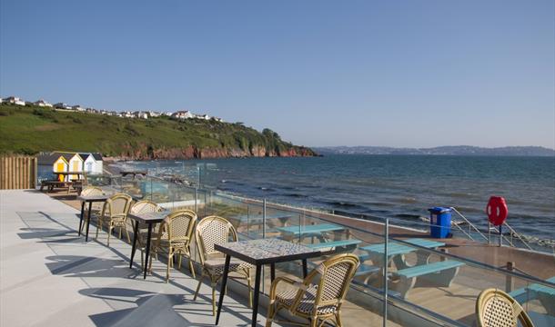 Seaside terrace seating at Venus Cafe, Broadsands Beach, Paignton