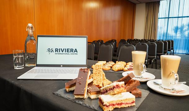 Laptop with refreshments in the Grace Murrell Suite, Riviera International Centre, Torquay, Devon