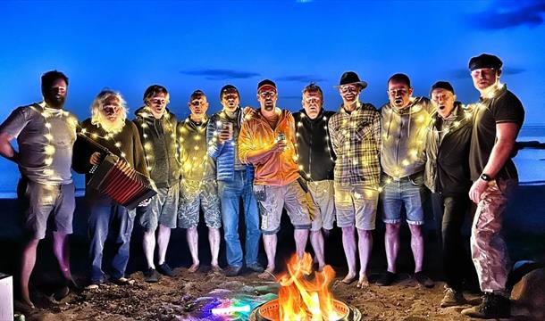 singing in the twilight on a beach