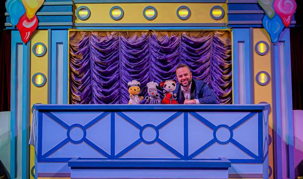 enjoy the sooty and sweep show at crealy theme park