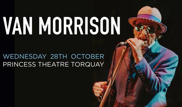 photo of Van Morrison performing on stage wearing a hat and sunglasses