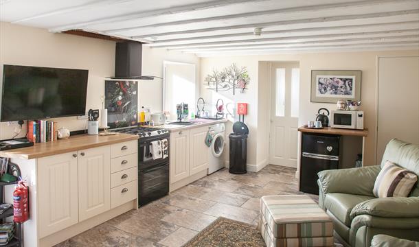 Fully-fitted open plan kitchen at Court Prior Luxury Apartment, Torquay, Devon