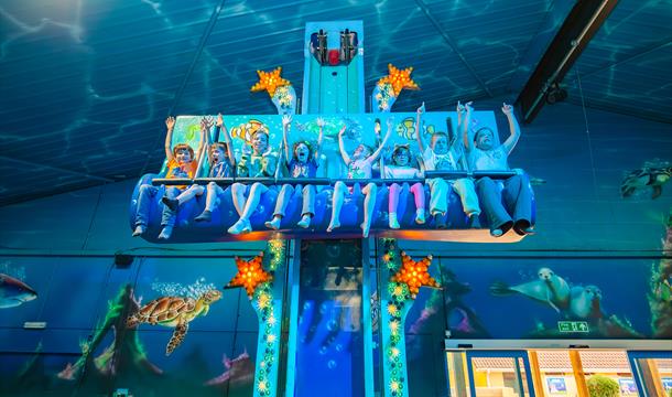 a group of young riders enjoying a sea life themed ride at crealy theme park