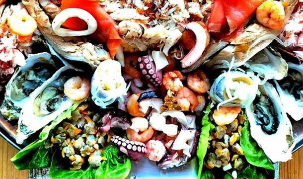 images of fresh seafood and interior shots of the restaurant