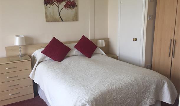 Bedroom at Adelphi Holiday Apartments in Paignton, Devon