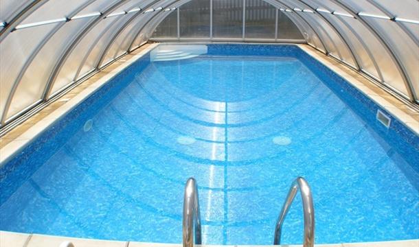 Covered heated pool.  Atlantis Holiday Apartments, Torquay, Devon