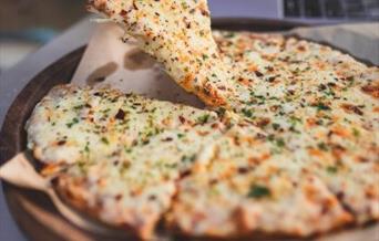 Sliced pizza from Pizza Nation