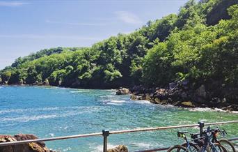 Bikes parked at Ansteys Cove, Torquay, Devon