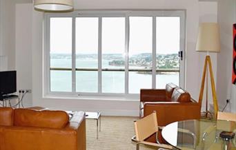 Lounge with sea view from Apartment 17, Astor House, Warren Road, Torquay, Devon